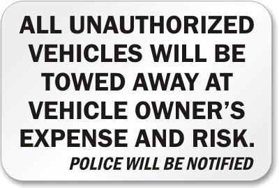 All Unauthorized Vehicles Towed Sign