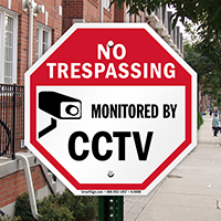 No trespassing monitored by CCTV with graphic sign
