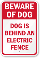 Beware Dog Is Behind An Electric Fence Sign