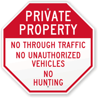 No Unauthorized Vehicles & No Hunting Sign