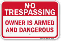 Owner Is Armed No Trespassing Sign