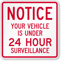 Vehicle Is Under 24 Hour Video Surveillance Sign