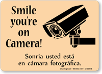 Bilingual Smile You're On Camera Sign With Graphic
